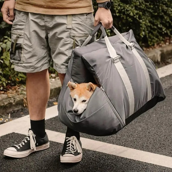 DockSeat carried by its handles and used as a travel bed